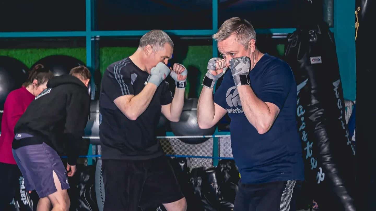 Gym member showing determination and focus Gym member showing determination and focus