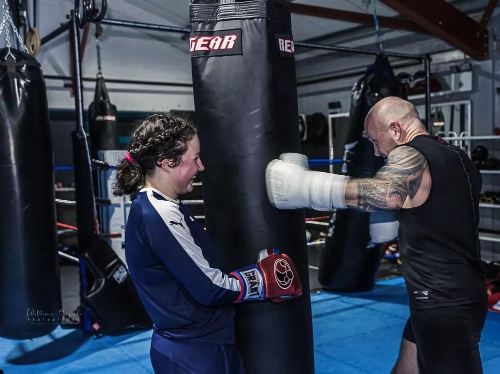 Partner drills in kickboxing class Partner drills in kickboxing class